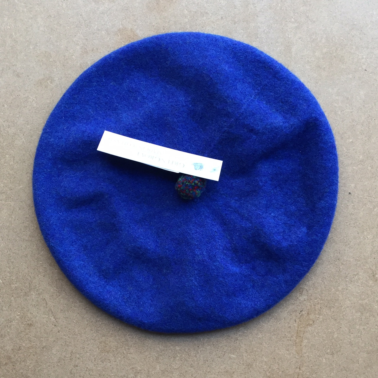 Green Grove Weavers Pom Pom Beret hat -Klein Blue-