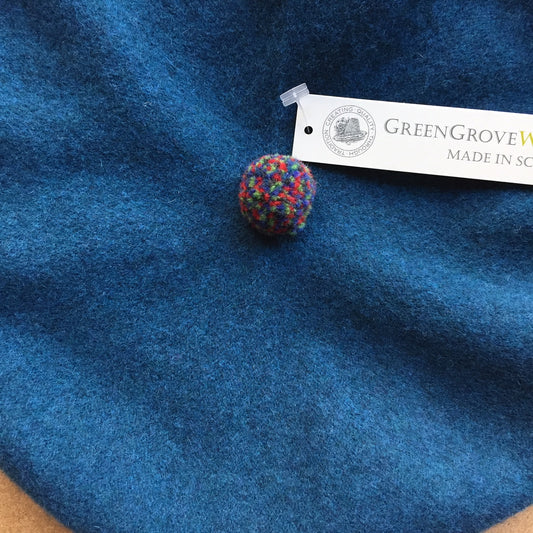 Green Grove Weavers Pom Pom Beret hat -peacock-