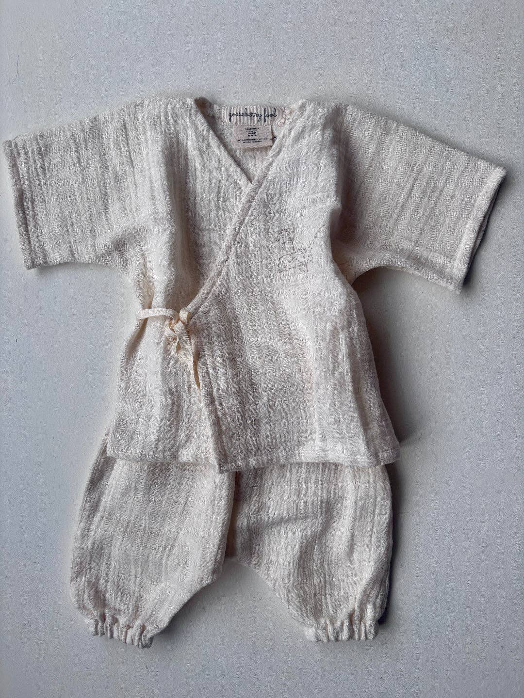 Organic cotton muslin baby pyjamas: 6-12