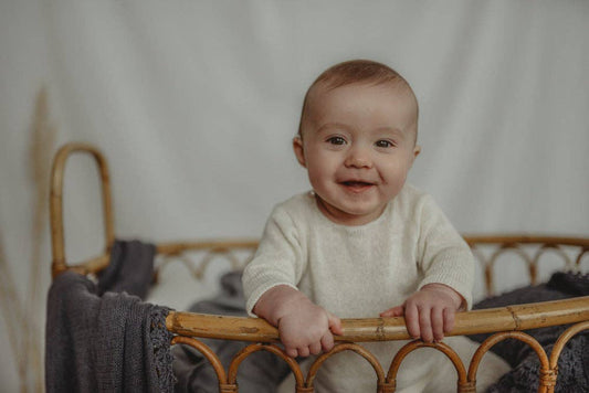 Lightweight organic cotton knit baby jumper: Cream / 12-18 / With crochet trim