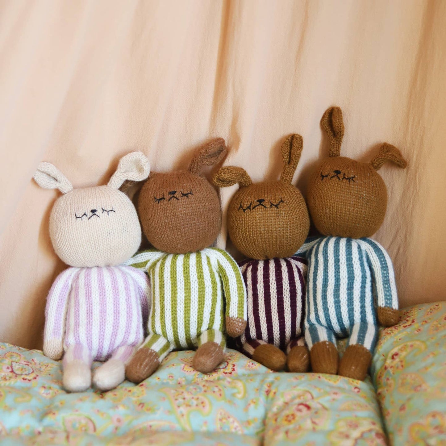Hand knitted striped bunny toy: Pink